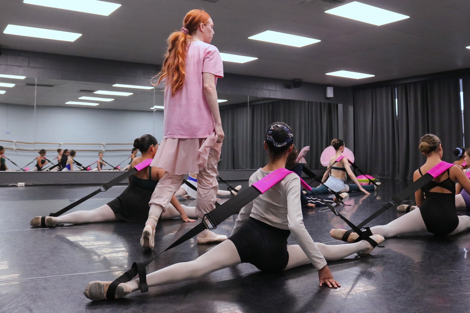 Students stretching in class